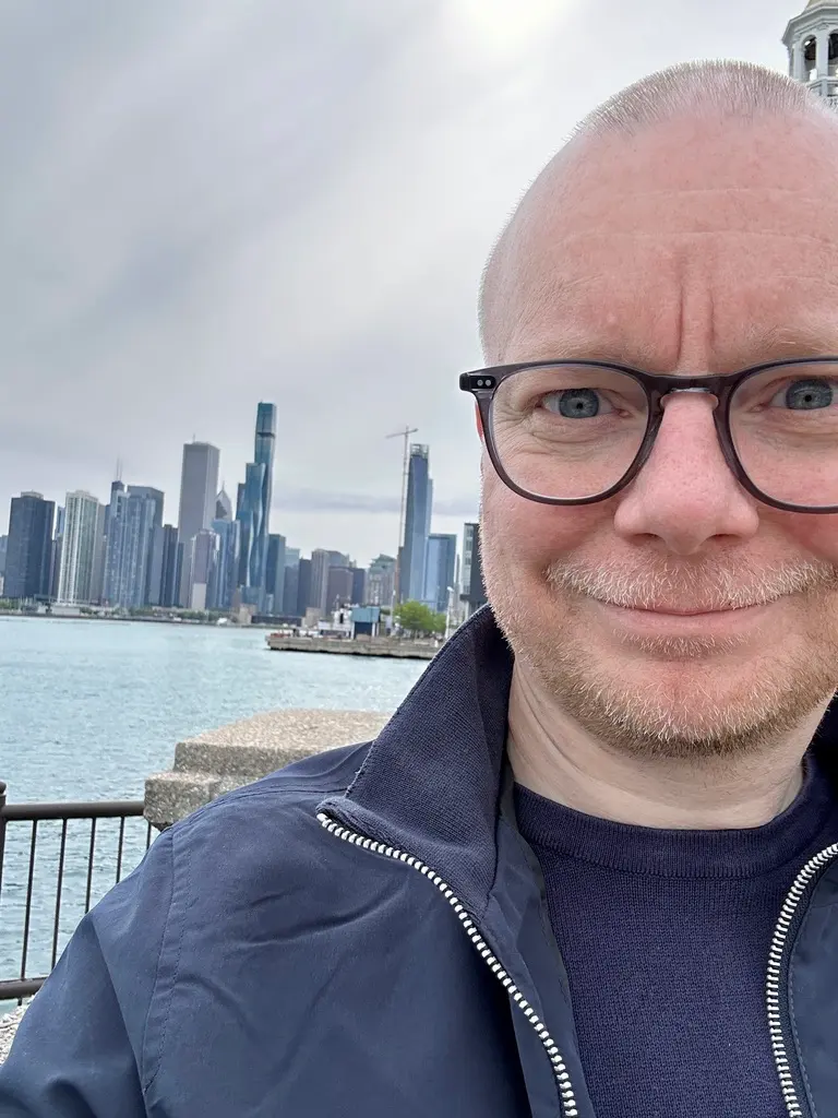 René Fischer in front of the Chicago skyline.